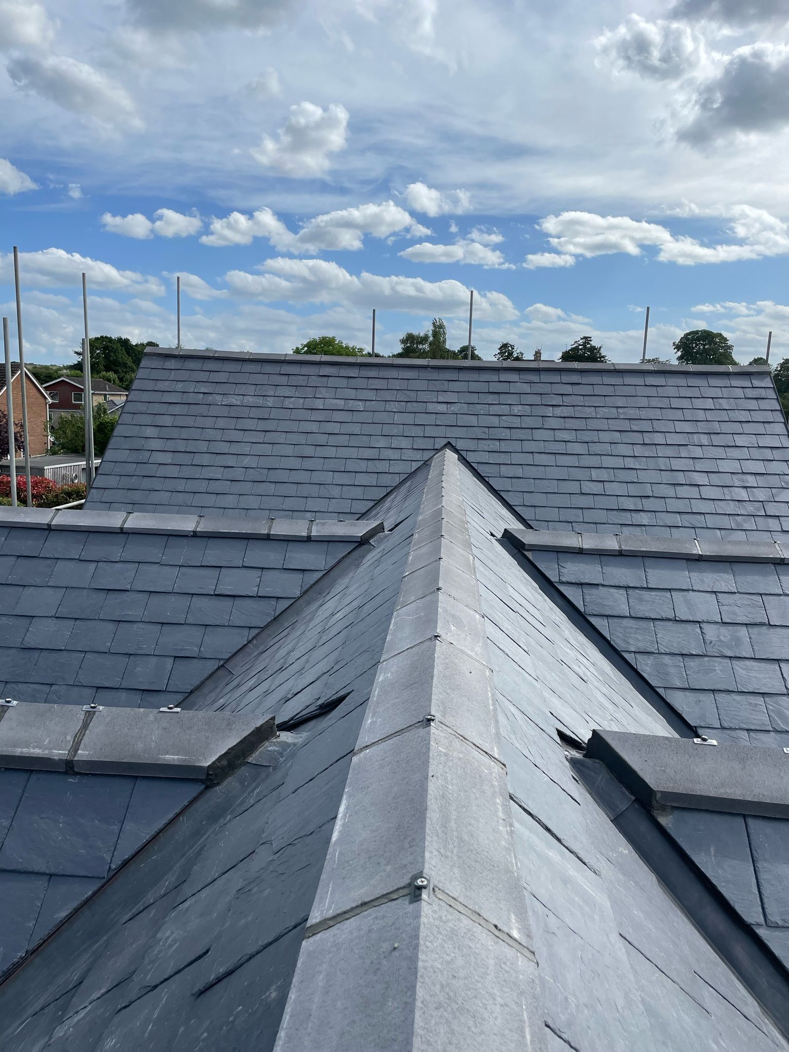 Finished slate roof with ridge tiles